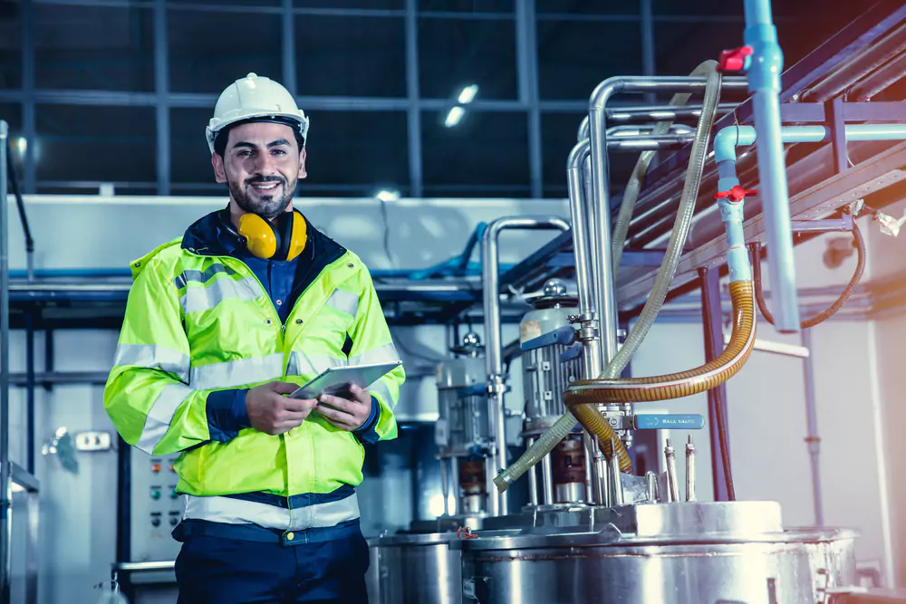 Happy Engineer, Male,Worker Working In chemical Factory Using Tablet Computer